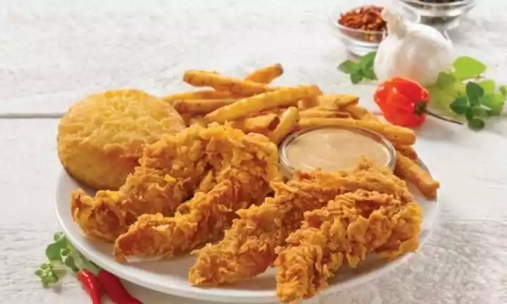 2 handmade strips, fries, a drink with dipping sauce